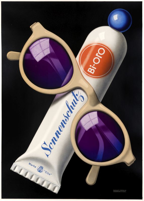 Close-up view of sunglasses and sun tan lotion tube; purple, blue, white, black