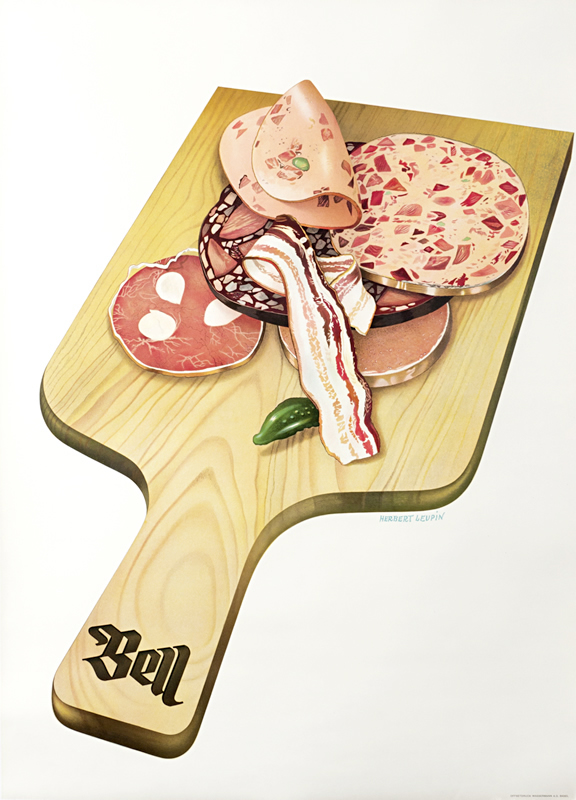Bell carving board with charcuterie meats; red, brown, pink