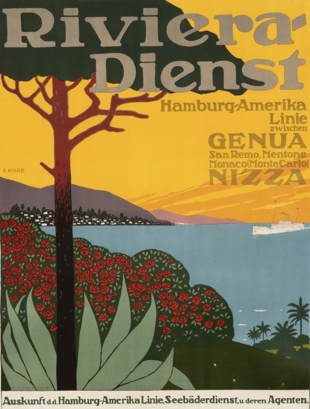 View of ocean and coast, trees and flowers in foreground; yellow, blue, green, red